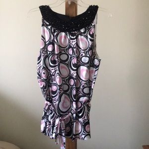 Polka dotted sleeveless blouse